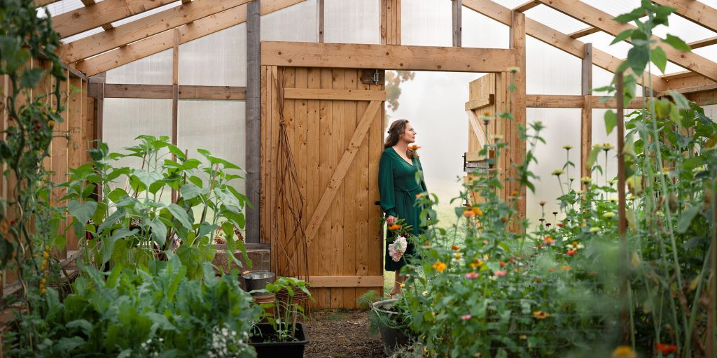 Surface pattern designer Karin Östergren in the greenhouse